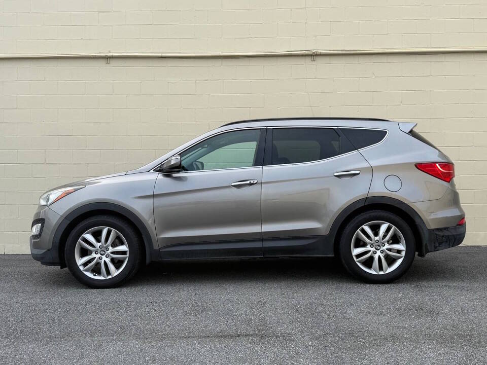 hyundai santa fe 2014 5XYZU3LA4EG191408 image hyundai santa fe 2014 5XYZU3LA4EG191408 image